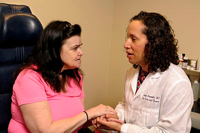 Dr. Ileana I. Showalter with a patient