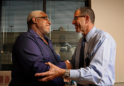 Alan E. Oshinsky with patient