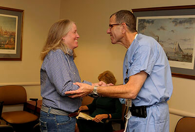 Alan E. Oshinsky with patient